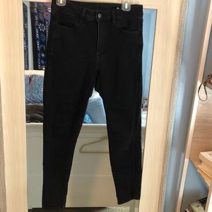 Black super high rise skinny jeans